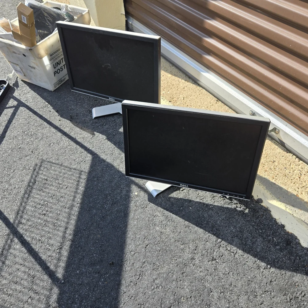 Dell Dual Black Monitors with Silver Stands